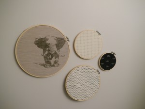 My finished design. I played with a few layouts before landing on this one. Note: the bottom hoop isn't quite flush as I couldn't bring myself to cut the onesie. 